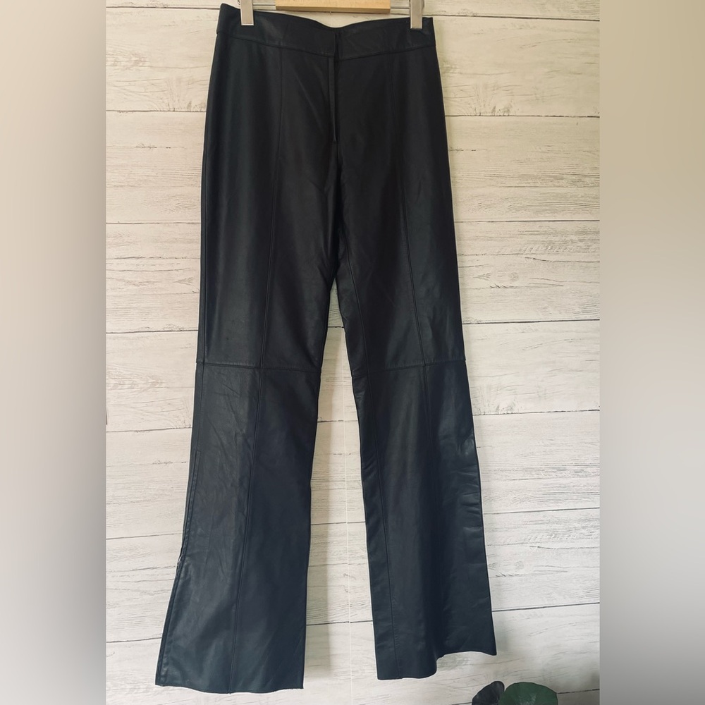 Danier black leather zip leg high waisted 
Slight flare sleek and gorgeous sz 4 - Picture 3 of 12